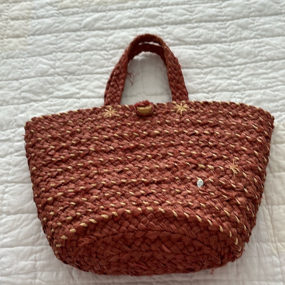 Lady’s summer rattan handbag.